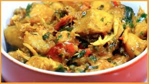 A bowl of Keke Fieye — authentic Ijaw plantain pottage with unripe plantains and traditional seasonings