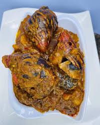 Keke Fieye plantain pottage simmering in palm oil base with traditional seasonings